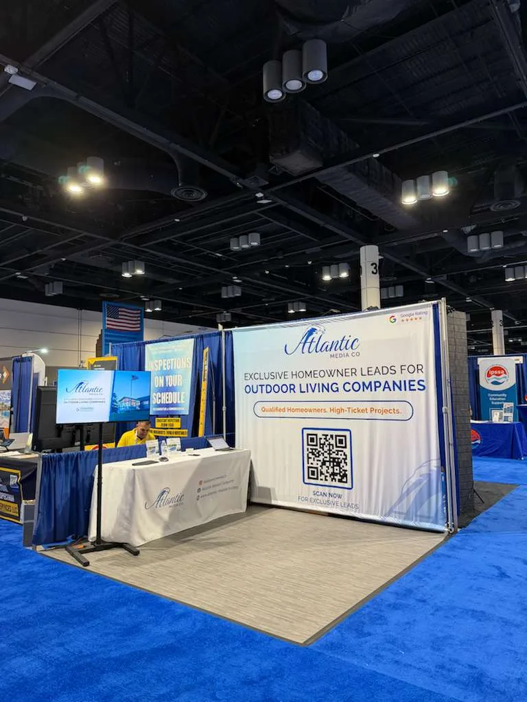 The Atlantic Media Company booth with branded banners at a national pool and spa show